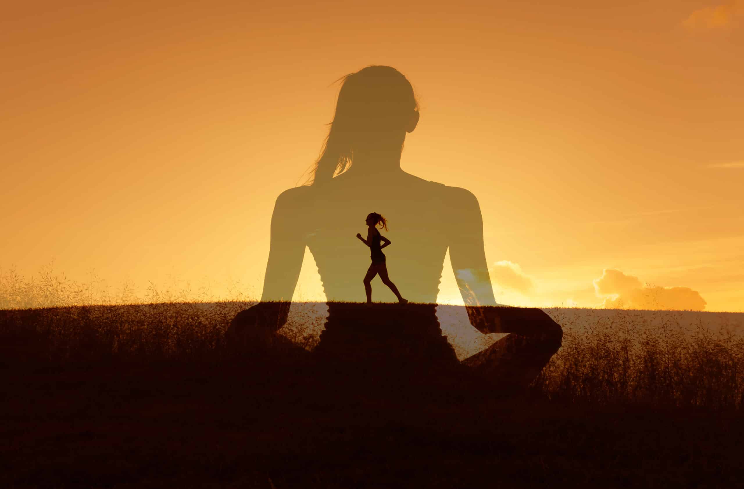 A woman running at sunset